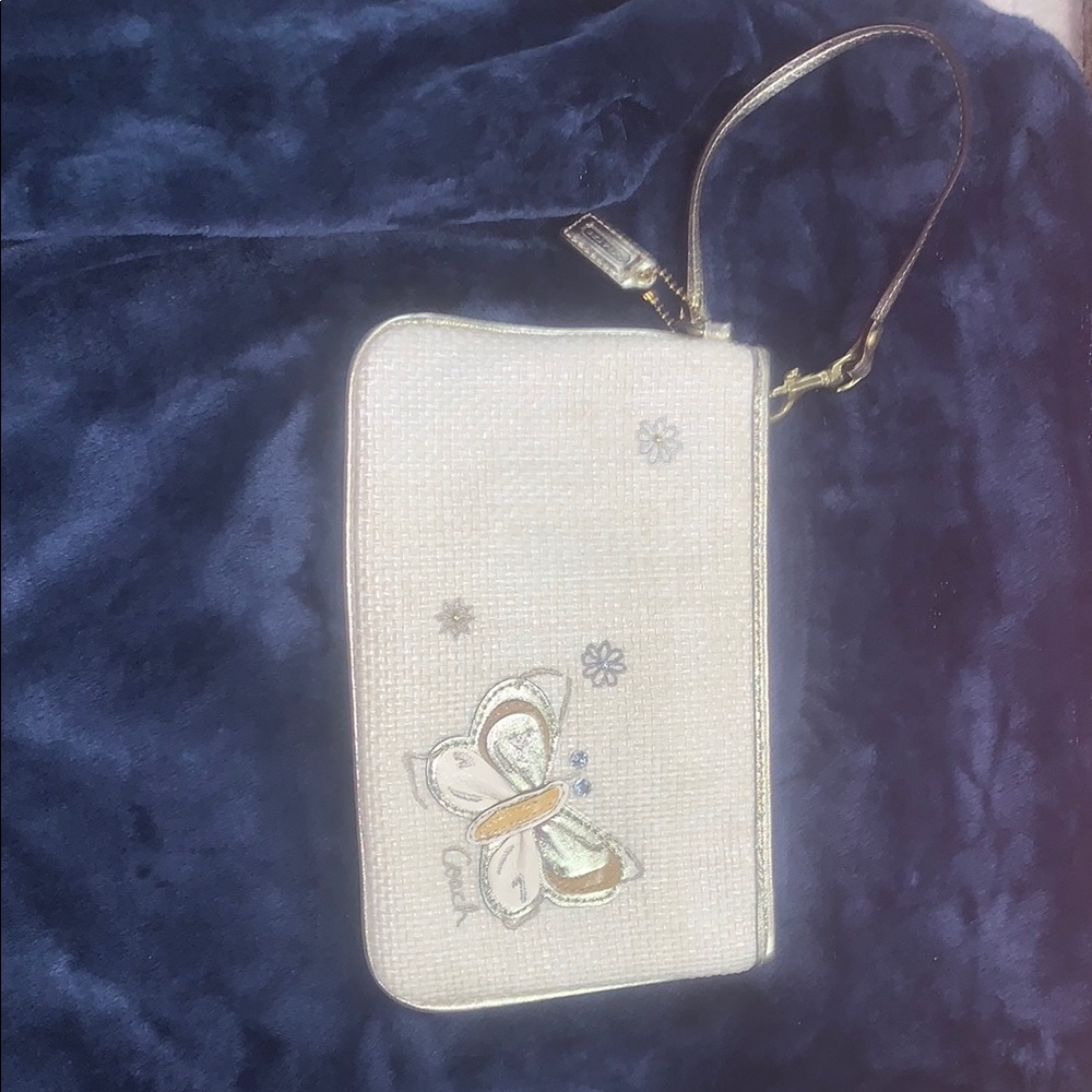 Coach Cream Gold Wristlet with Elegant Bow